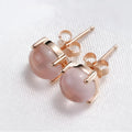 Rose gold Korean style stud earrings with synthetic Ross quartz and crystal inlay in drop shape