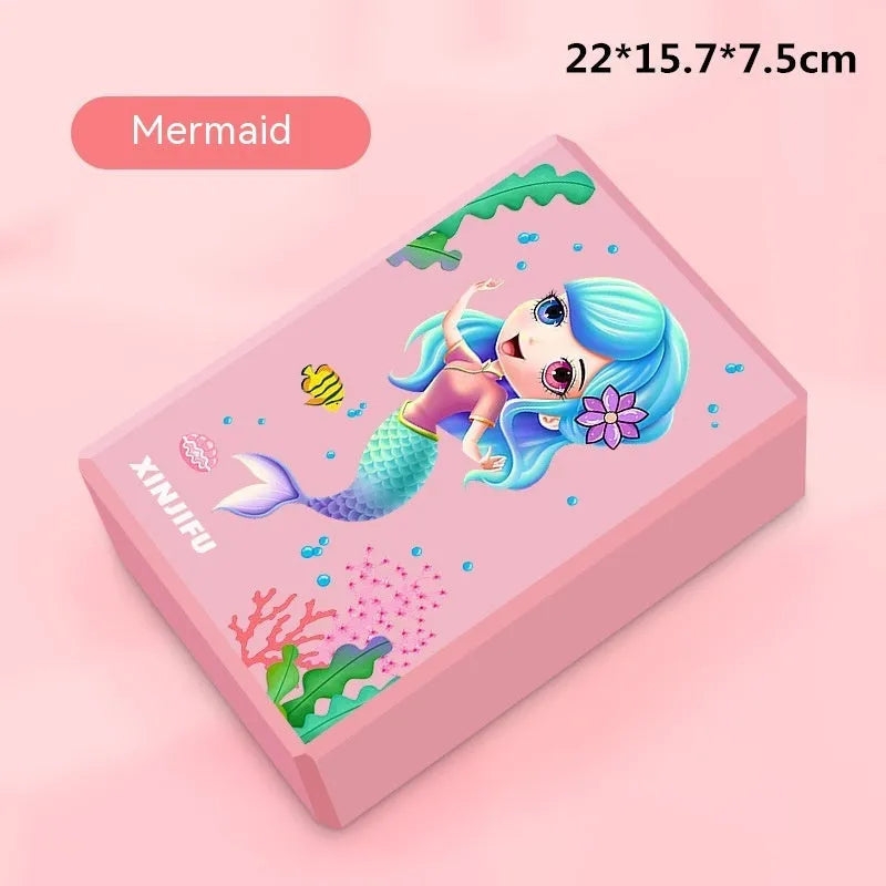 High-density EVA yoga block in violet colour next to a pink block with a cartoon print design.