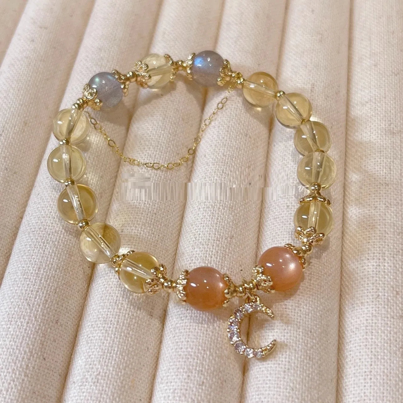 Women's Chinese-style crystal bracelet with citrine moonstone centrepiece and 14K gold electroplating