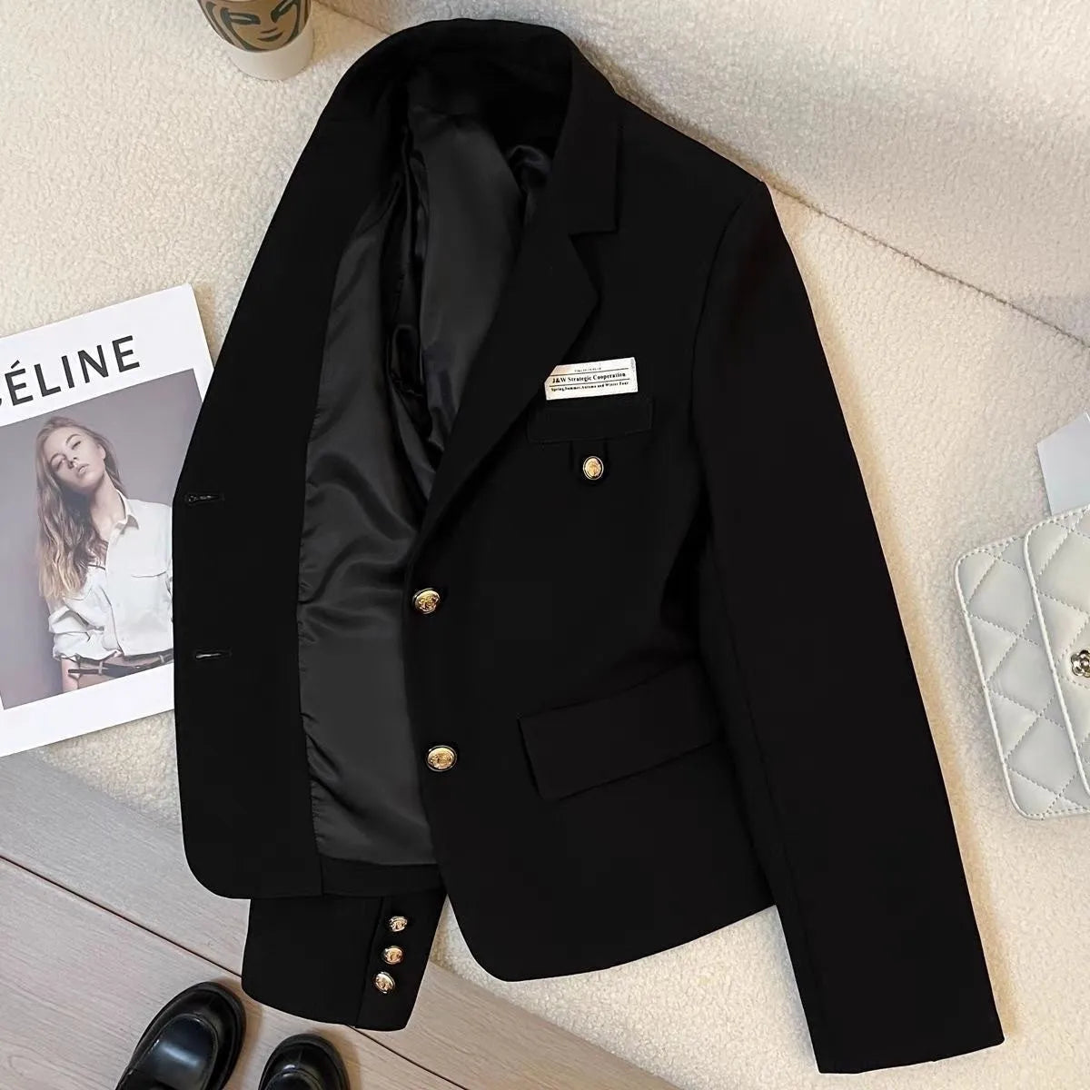 Black women's loose short suit coat with pockets and regular long sleeves