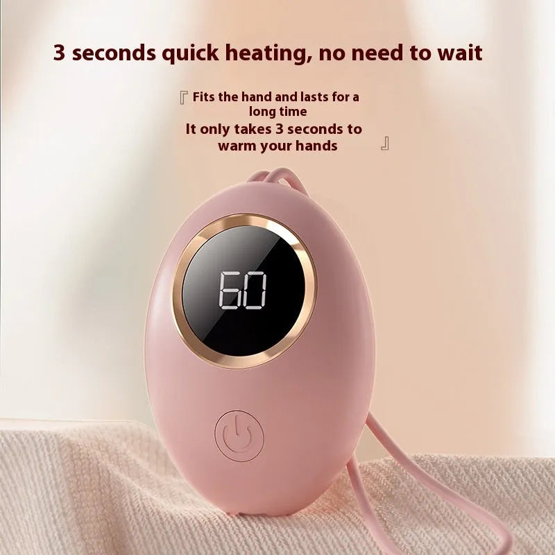 USB-powered hand warmer with digital display showing temperature, in charming blue colour