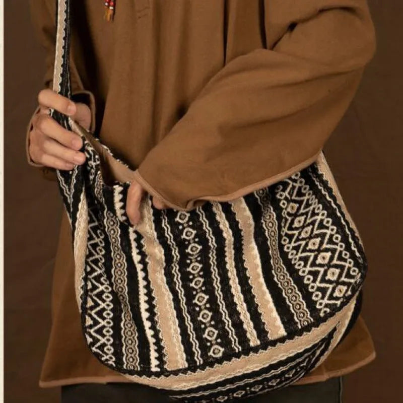 Corduroy vintage messenger bag with jacquard stripe pattern and adjustable plaid shoulder strap