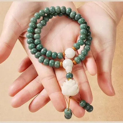 White Jade Bodhi Green Sandalwood beaded bracelet with a choice of safety buckle or lotus clasp.