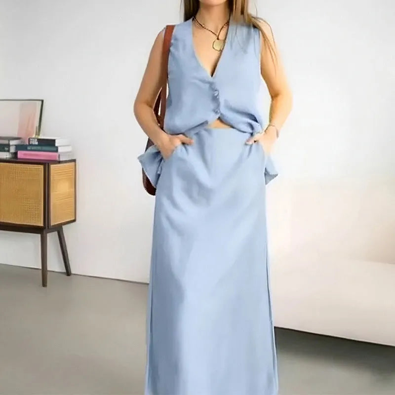 Blue women's two-piece lounge set with sleeveless top and long skirt on a hanger