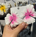 Close-up of women's alloy flower stud earrings with a blue oil-spot glaze and electroplated finish.