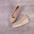 Women's wedge pumps with rope-pattern platform sole in black colour, showing shallow mouth design