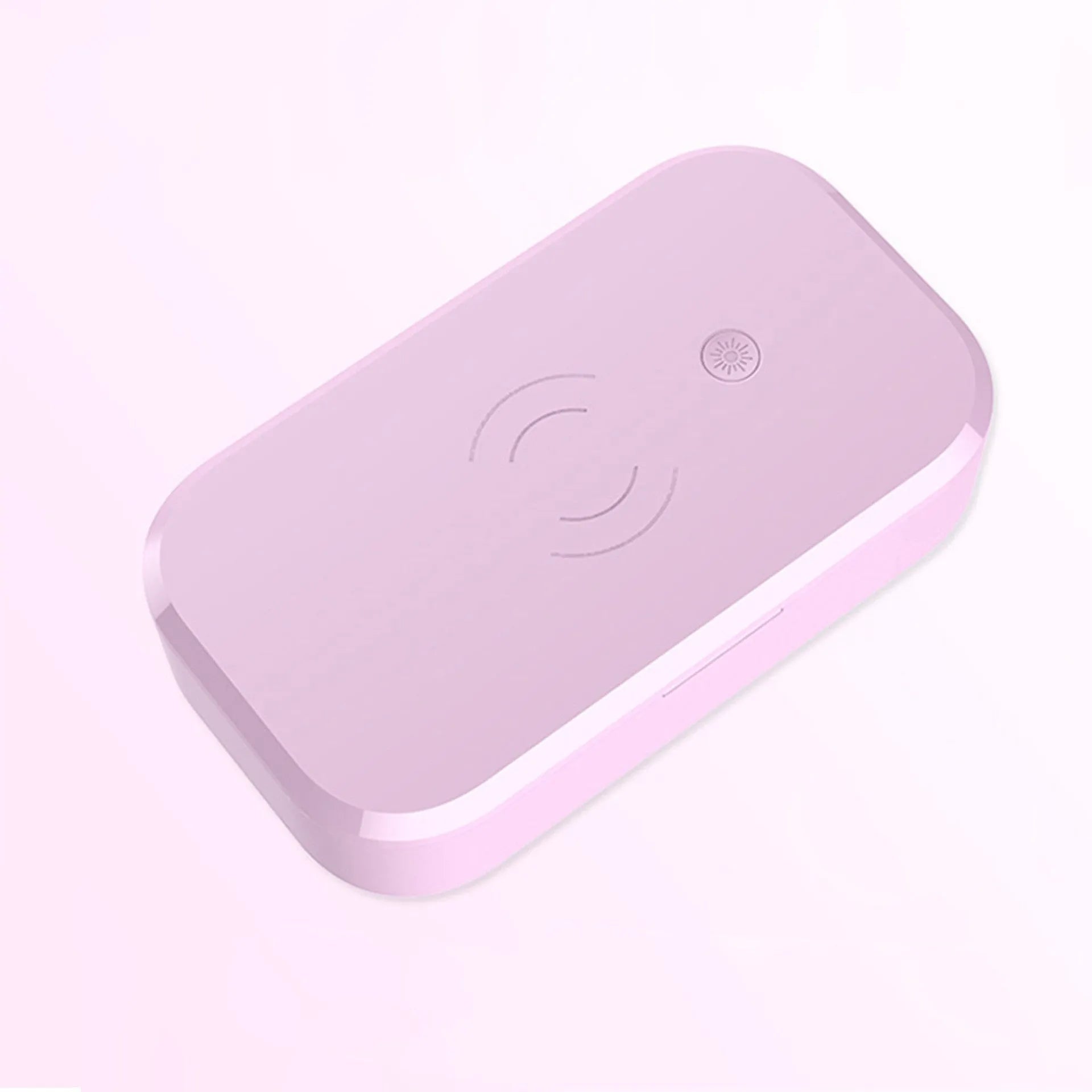 White ultraviolet disinfection box with wireless charging for mobile phones and beauty tools.