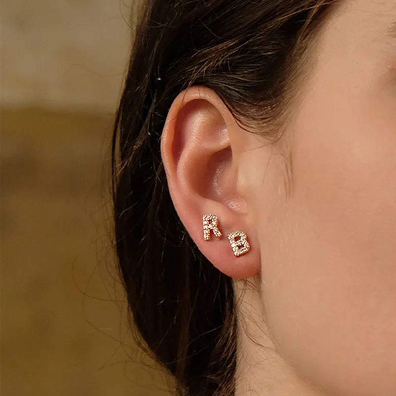 Brass gold plated alphabet letter earrings showing zircon stones on copper base with 26 English letters available