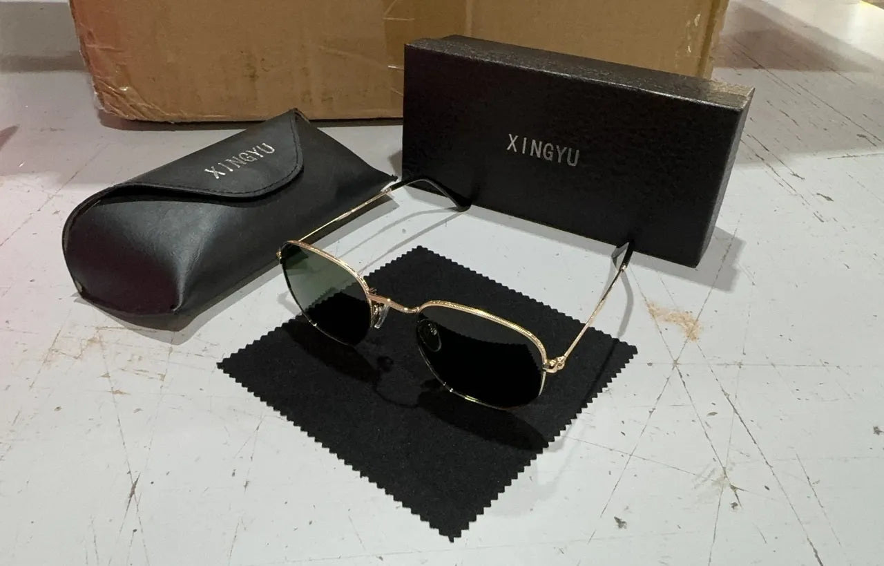 Classic round-frame sunglasses for men in various colours on a white background.