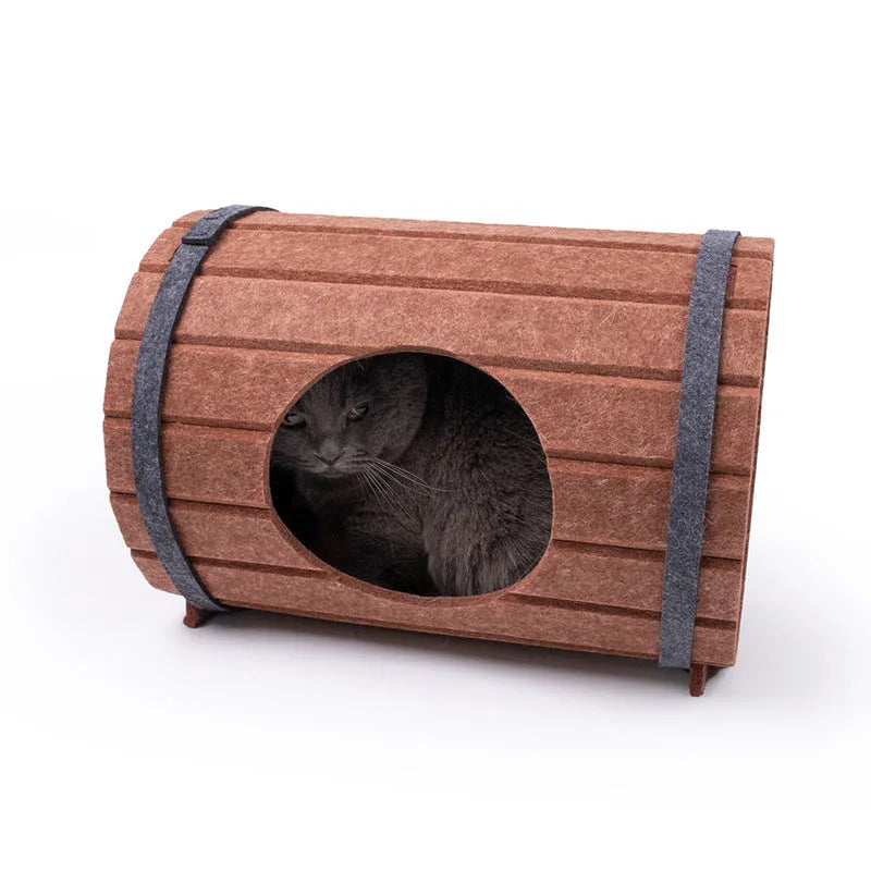 Assembled wine barrel shaped cat bed made from three polyester fibre felt panels with binding straps