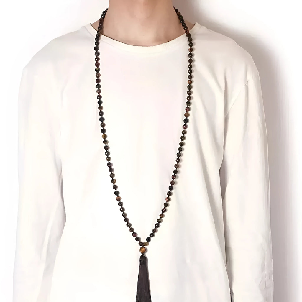 Long multicoloured agate and gemstone tassel necklace with geometric beads.