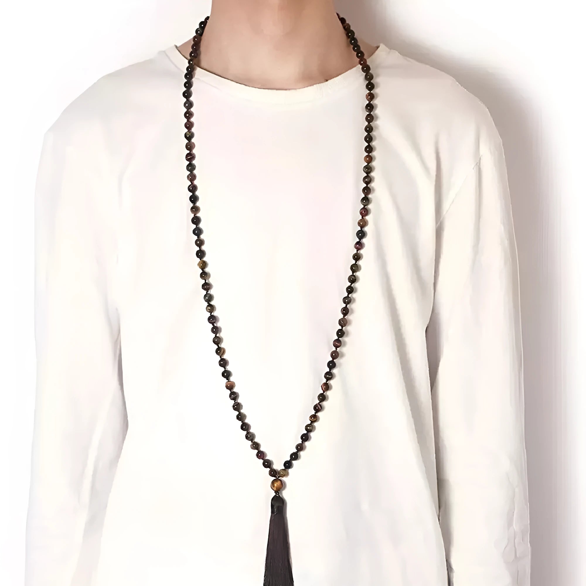 Long multicoloured agate and gemstone tassel necklace with geometric beads.