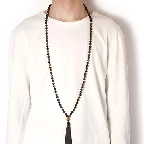 Long multicoloured agate and gemstone tassel necklace with geometric beads.