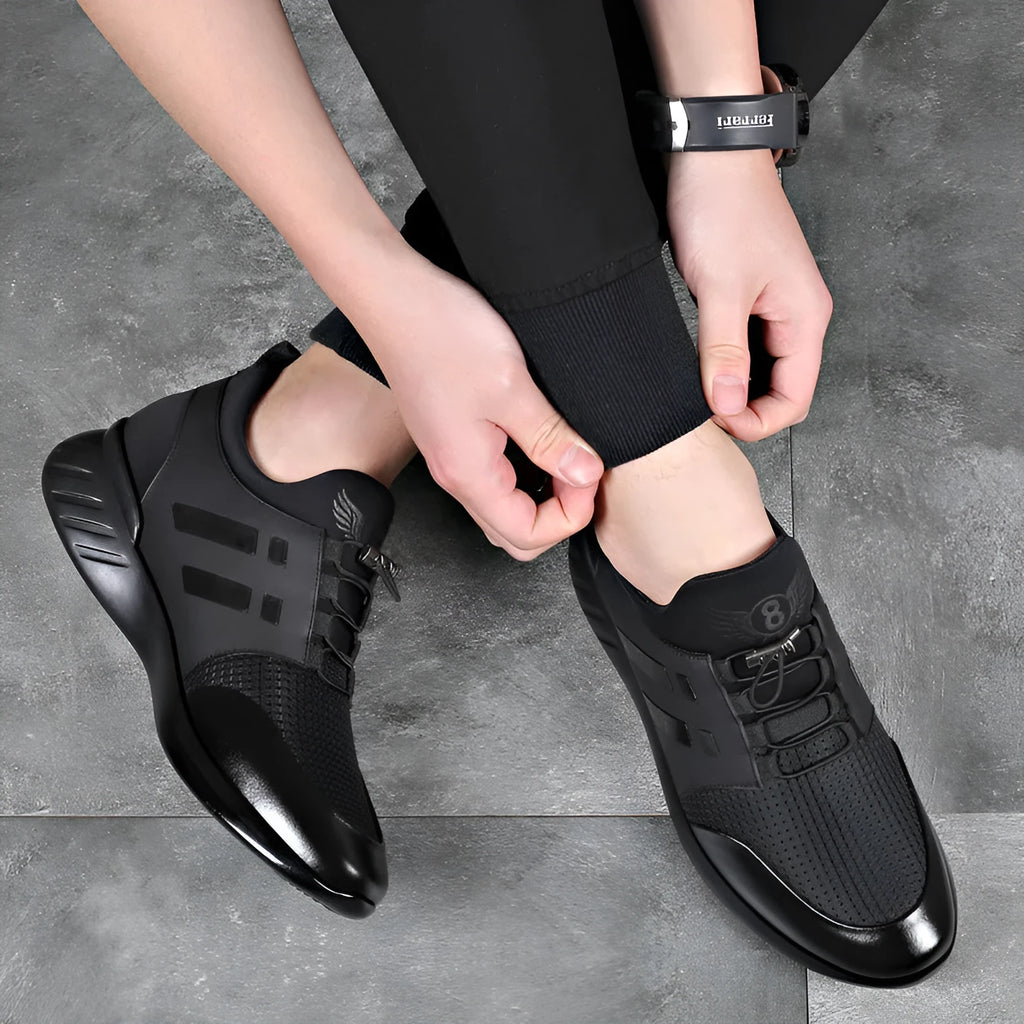 Men's black casual sneakers with a chunky heel for discreet height increase, available in leather or mesh.