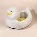 Duck-shaped fluffy pet bed in blue or white colours for small dogs and cats