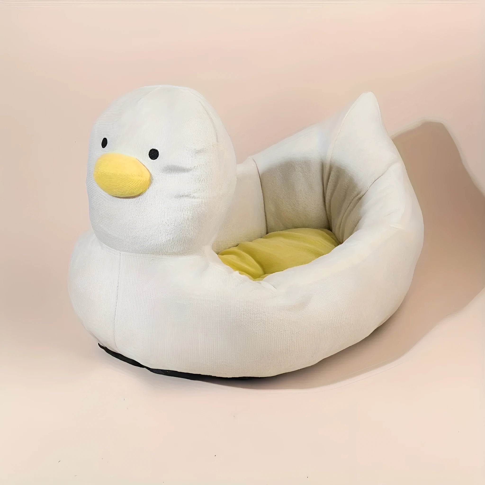 Duck-shaped fluffy pet bed in blue or white colours for small dogs and cats