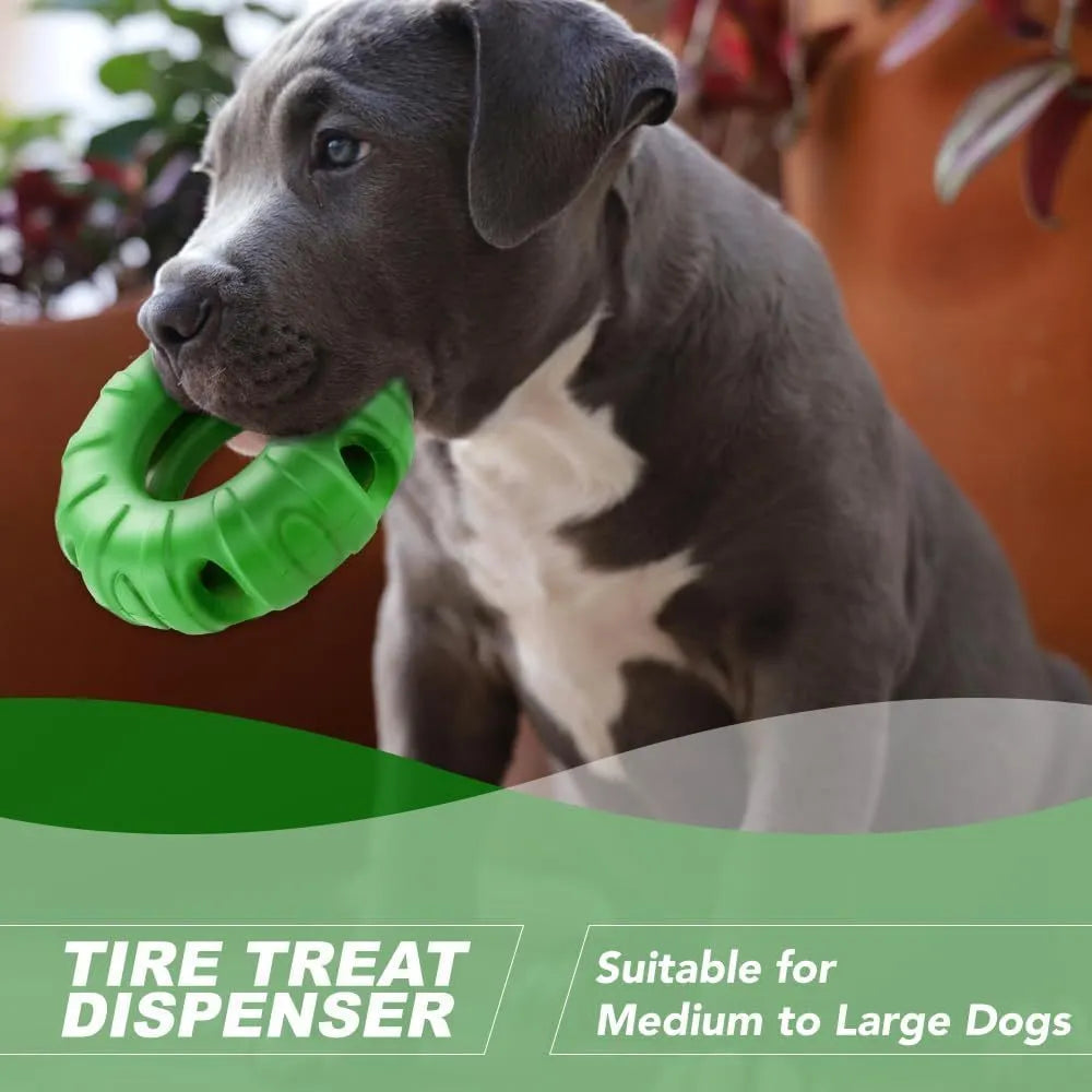 Blue natural rubber dog tyre chew toy with oval openings, shown as a slow feeder and interactive puzzle toy.