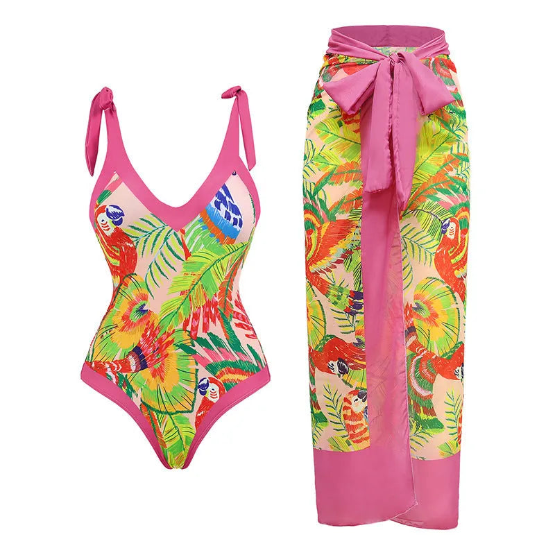 Pink floral print retro one-piece swimsuit with V-neck and thin skirt for women.