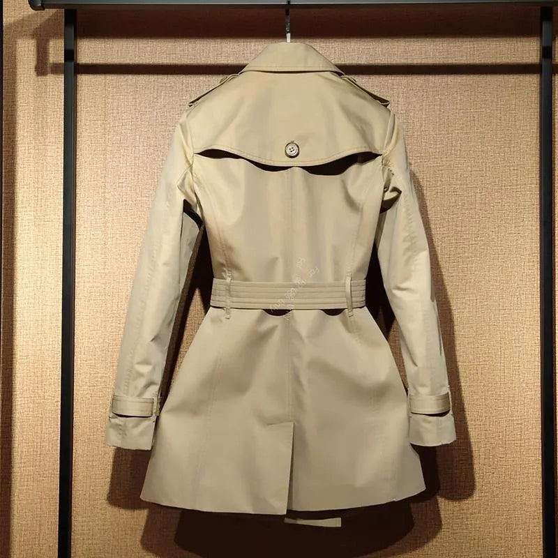 Khaki women's trench coat with double-breasted button front and flight sleeves
