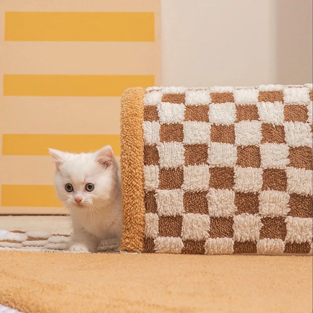 XL fan-shaped plush pet bed for dogs and cats with integrated tunnel in a plaid pattern.