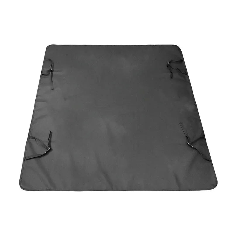 Dog car seat protector mat on rear bench seats in grey dog footprints pattern