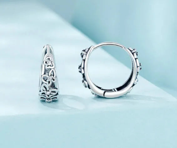 Sterling silver retro butterfly earrings with zircon detailing and hollow design