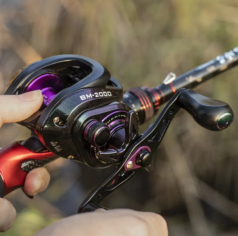 Colourful BM2000 fishing reel with magnetic brake system, shown in left and right-hand retrieve options.