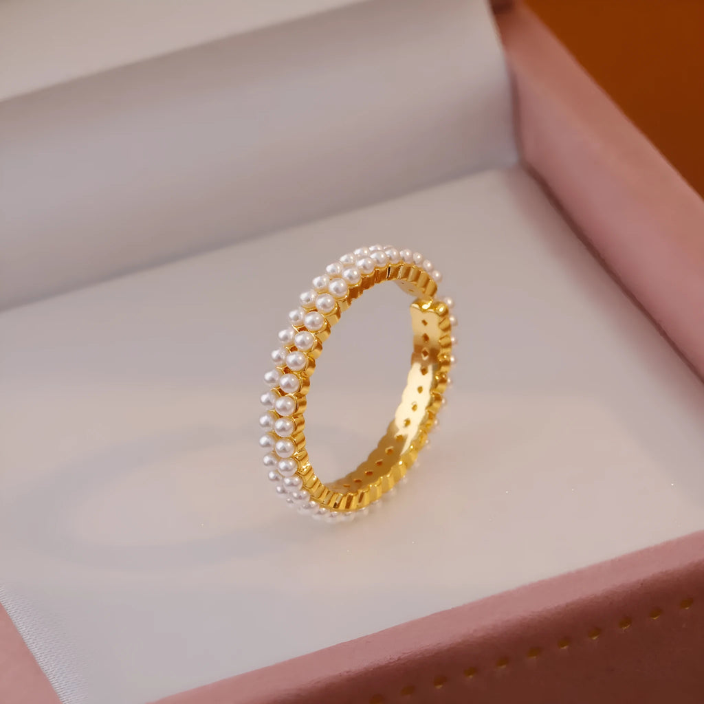 Gold electroplated open mouth ring with geometric design and round elements for women