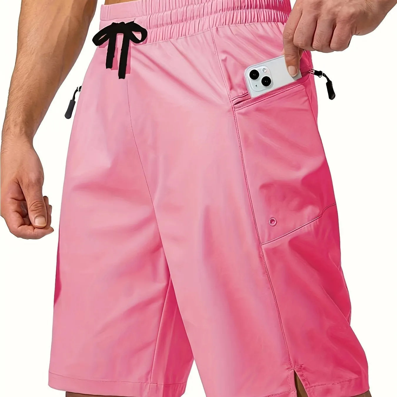 Men's solid colour beach shorts in straight cut with quick-drying polyester fabric