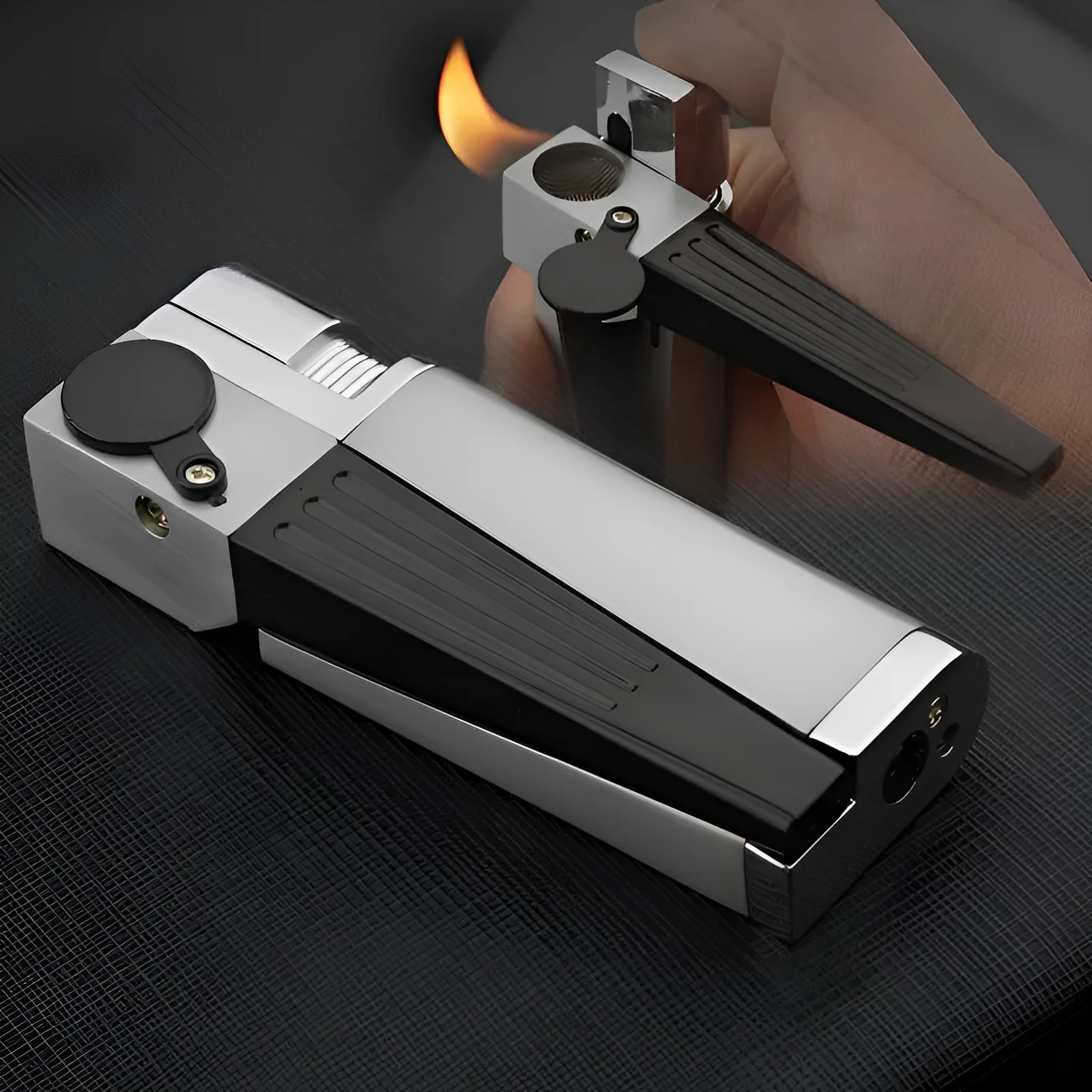 Folding metal pipe lighter showing open position with stash compartment visible