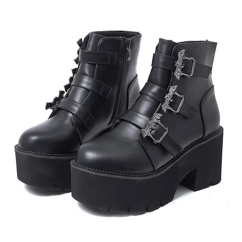 Black women's platform ankle boots with bat buckle Gothic detailing and side zipper