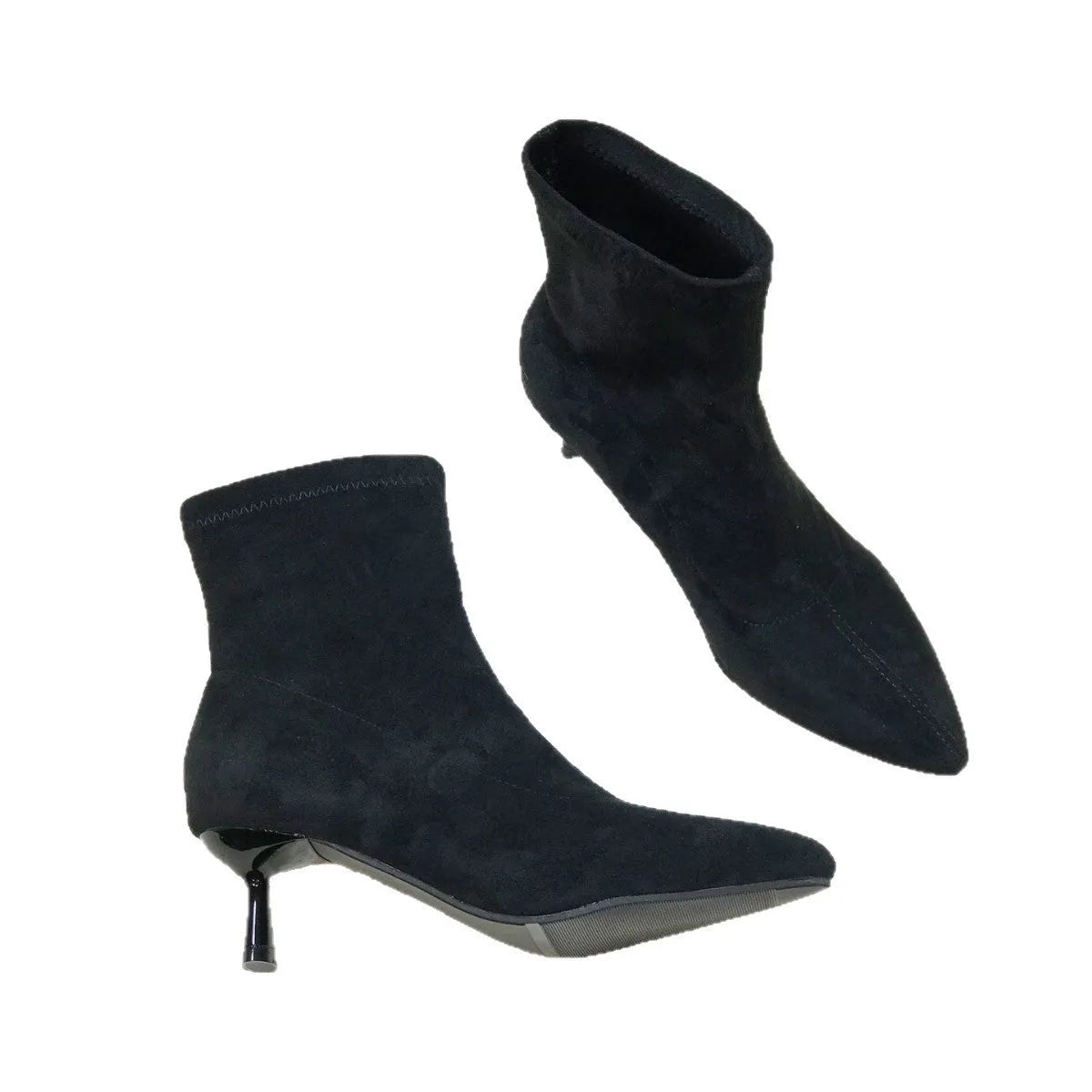Black pointed toe women's ankle boots with a stiletto heel on a neutral background.