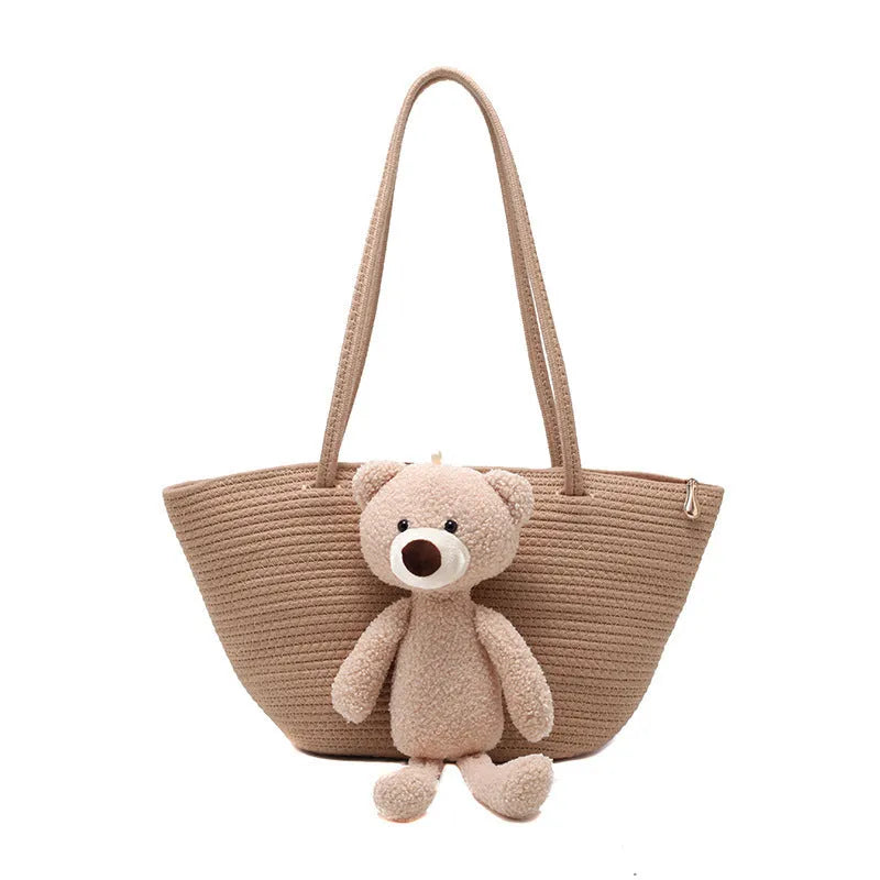 Cotton and linen woven bag with dumpling shape, double shoulder straps, and three-dimensional pocket