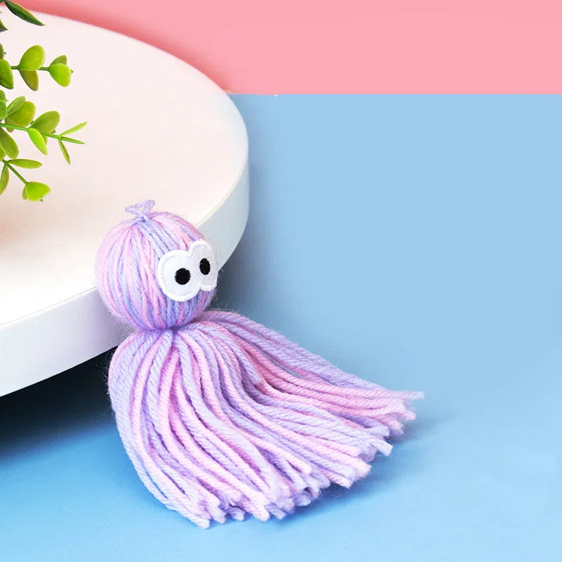 Hanging wool ball cat toy with teaser stick accessory in blue gray, pink blue, or pink purple colours