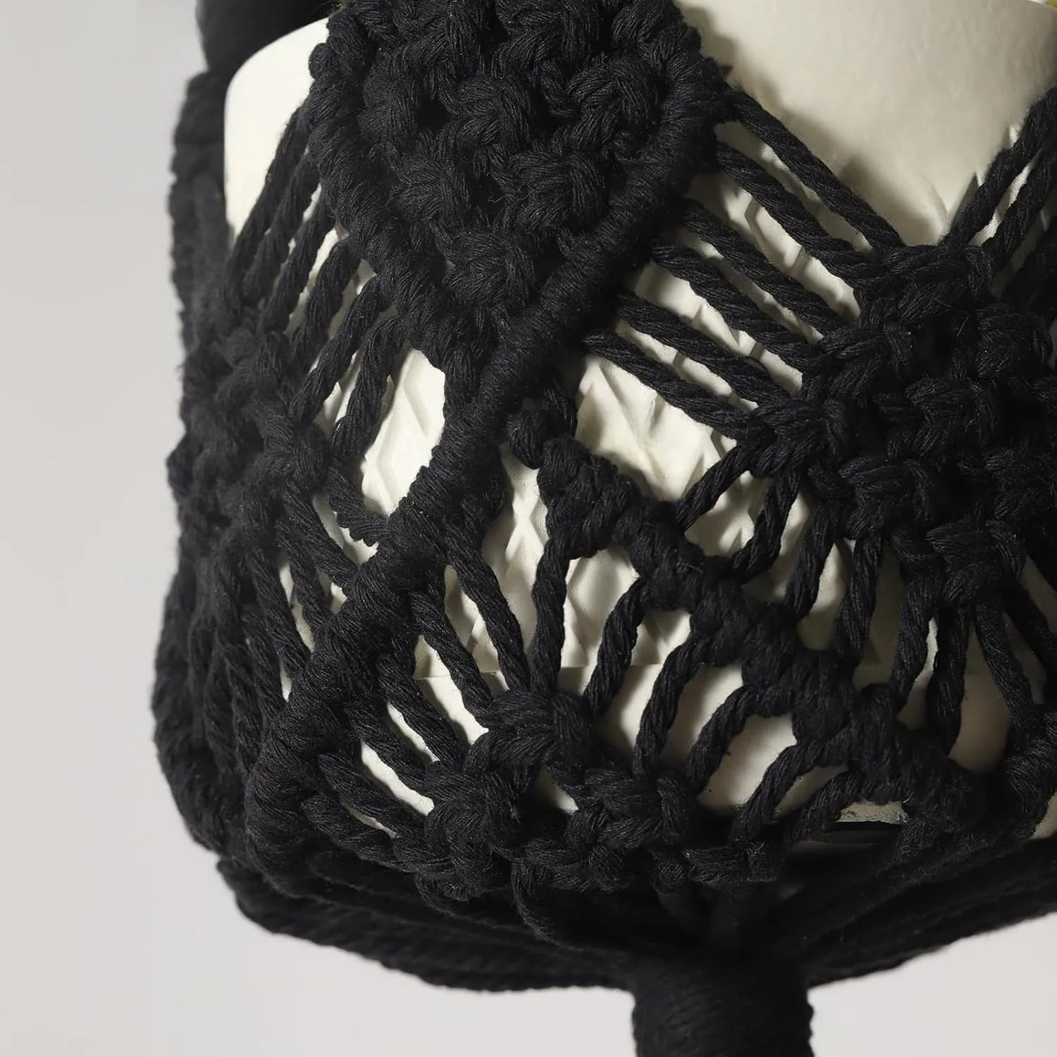 Hand-woven polyester cotton flower pot net pocket in brown, hanging with a green plant.