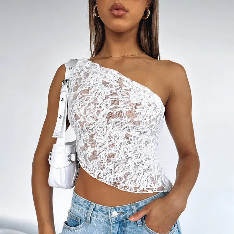 Womans lace backless vest top with asymmetrical sloped neckline in solid colour.