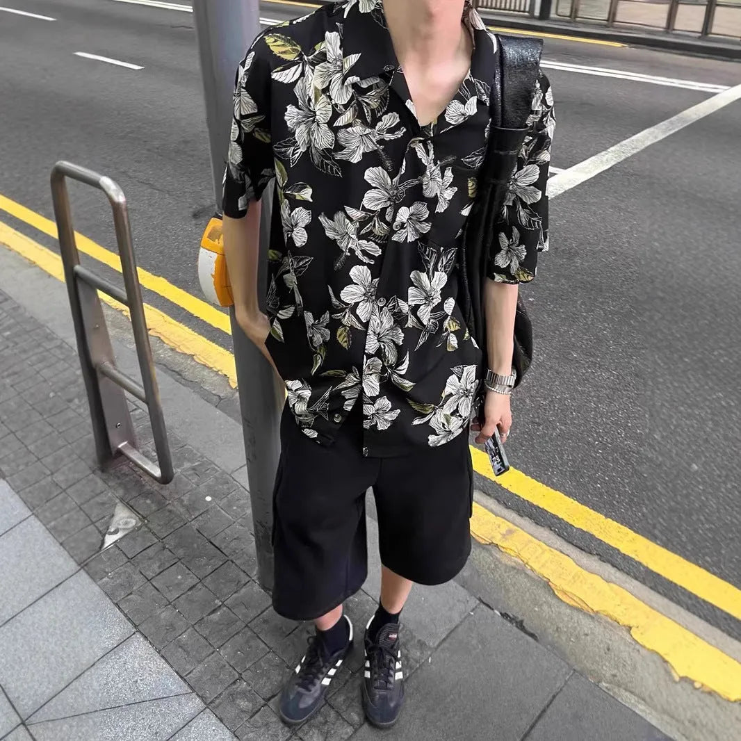 Black vintage Cuban collar ice silk shirt with flower print and short sleeves.
