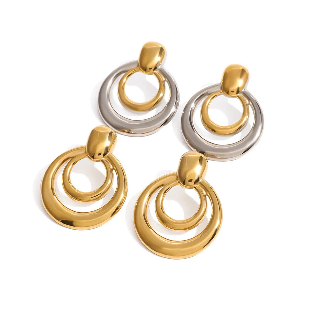 Round double layer hollow stud earrings with gold electroplated surface on titanium steel