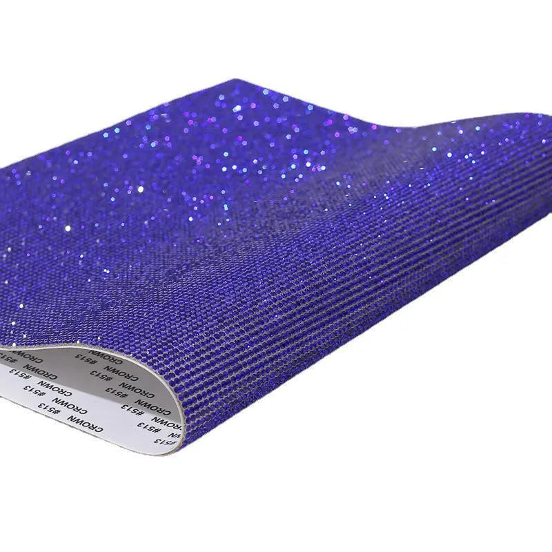 Sheet of rhinestone stickers with hot drilling glue net in various colours including red, black, and light green.