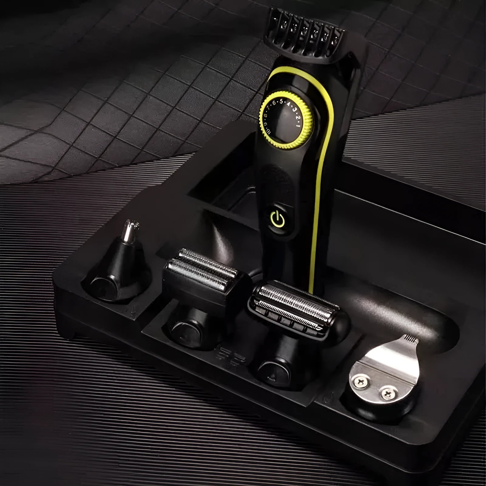 Black KM-696 rechargeable electric hair clipper set with stainless steel blade and cleaning brush