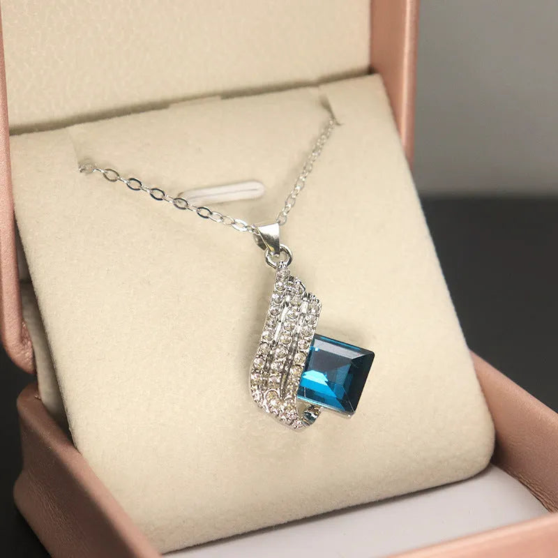 Necklace and earring jewellery set with cross chain design and alloy pendant