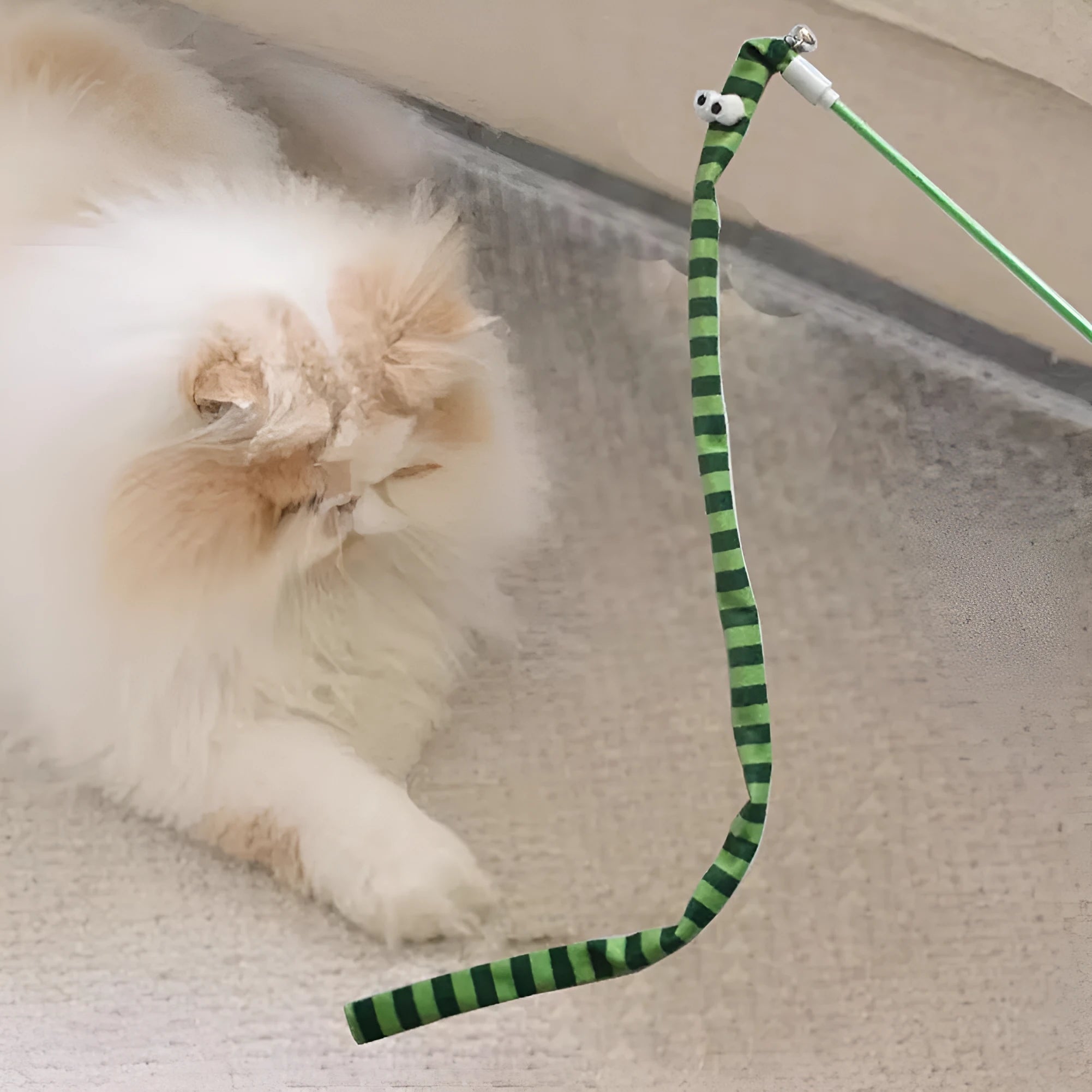 Cat wand toy with polycarbonate pole and long plush strip in vivid colours for interactive feline play