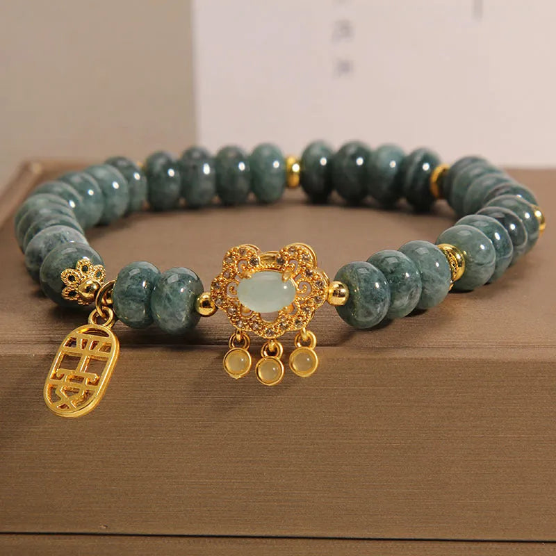 Women's natural emerald green jade bracelet with alloy safety lock clasp and abacus beads design