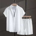 Men's black cotton blend short sleeve shirt and shorts casual suit set on a hanger.