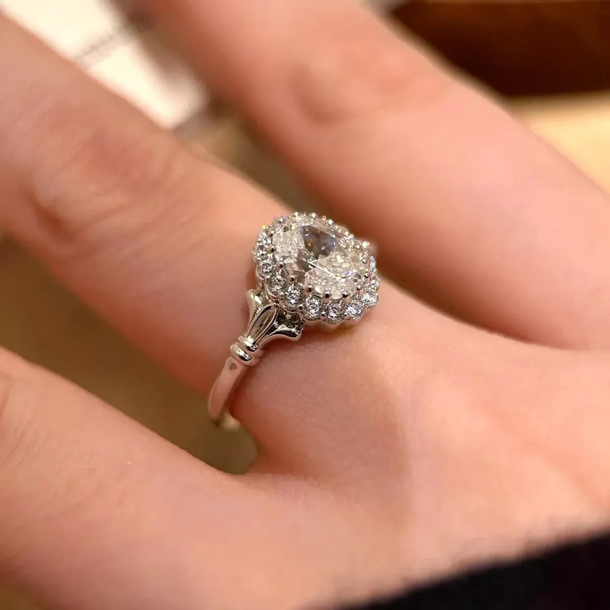 Silver geometric ring with diamond-shaped bridal bouquet pattern and adjustable opening
