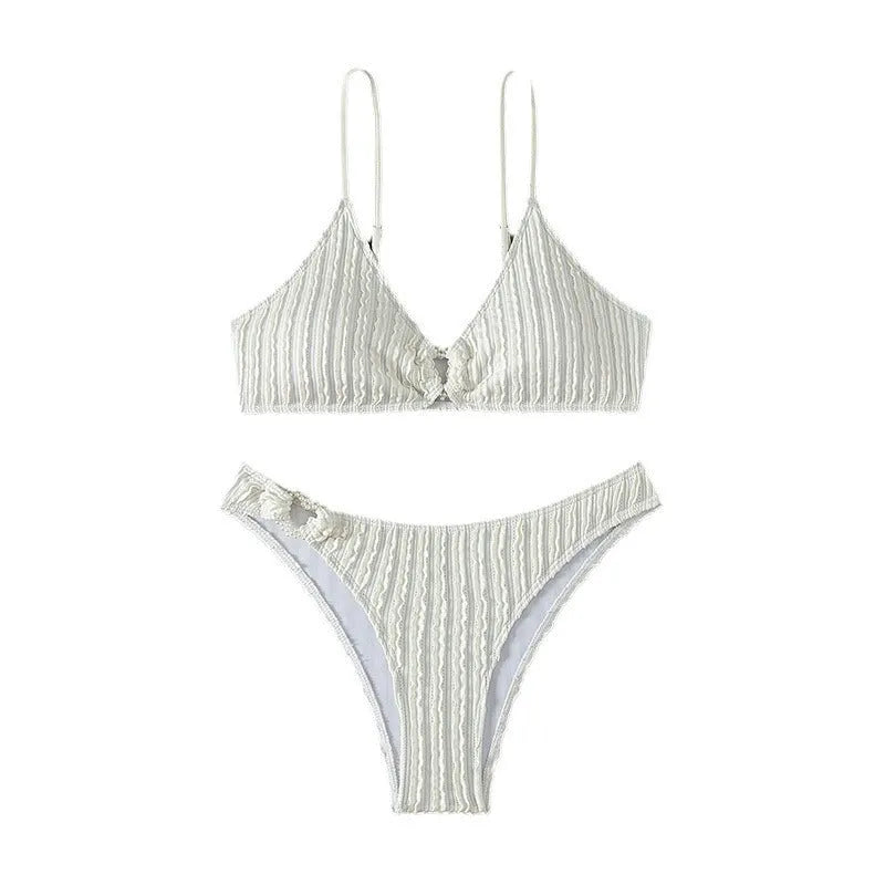 White women's V-neck swimsuit with split design and matching shorts