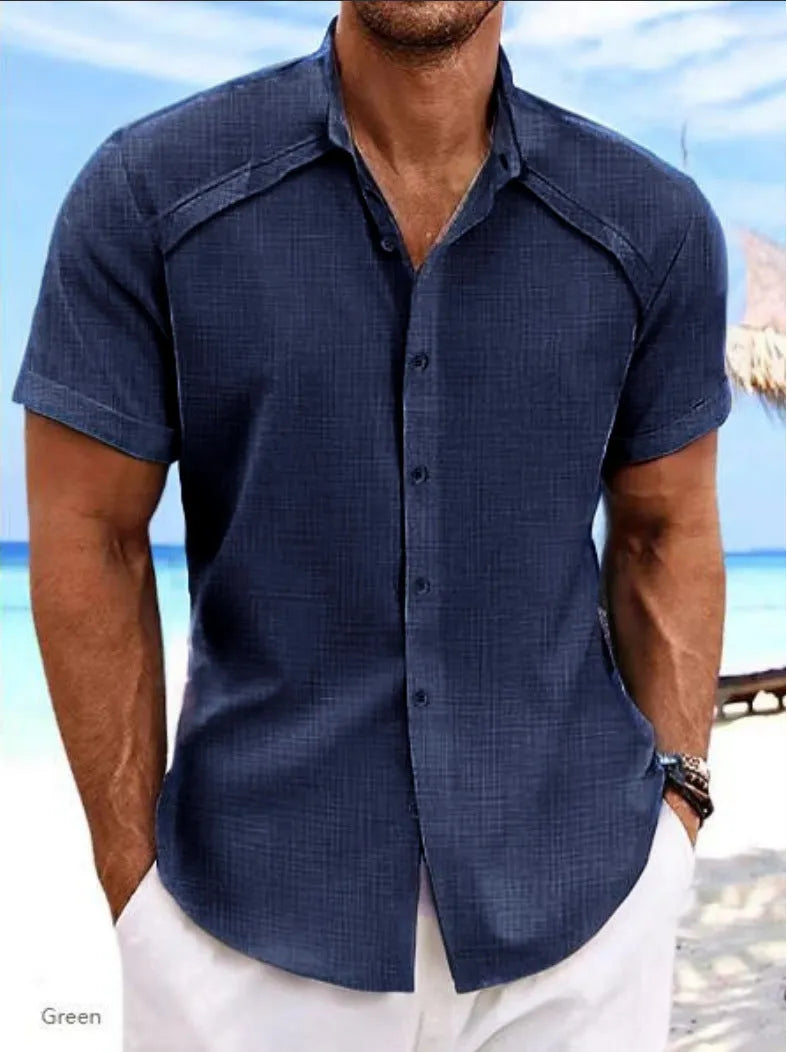 Men's solid colour short sleeve casual shirt in cotton blend fabric on a hanger.
