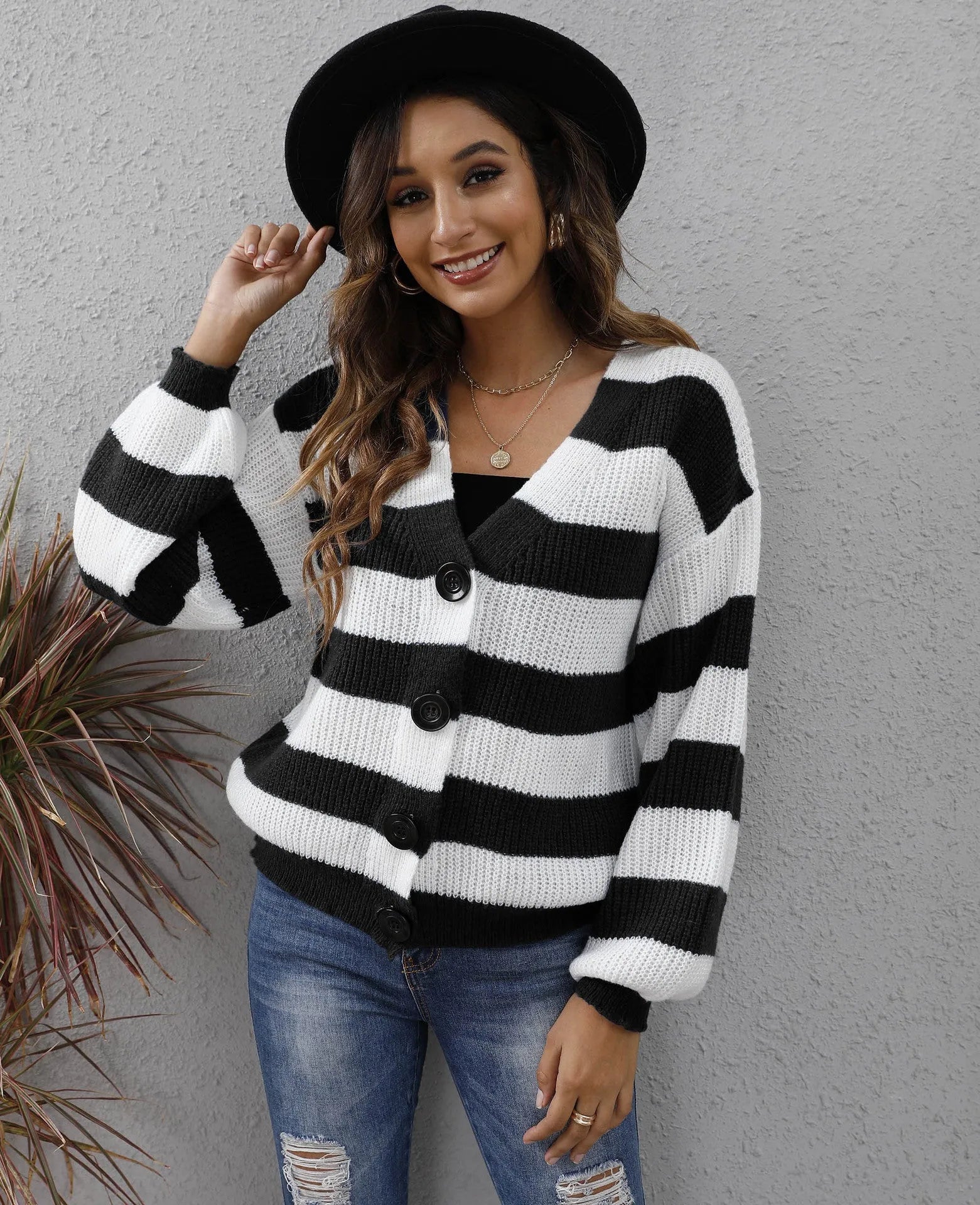 Women's striped cardigan sweater in deer plush fabric with button front, shown in blue colour.