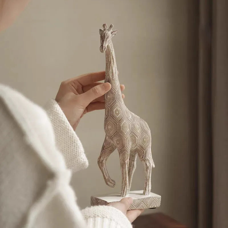 Wood colour synthetic resin giraffe ornament on a table, showing European style and 30.5cm height.