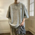 Men's grey retro t-shirt with raised letter print in loose fit short sleeve design